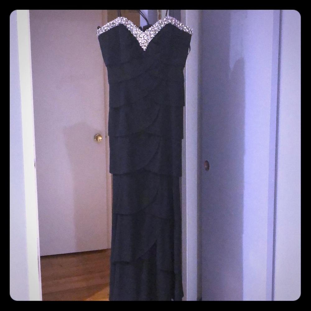 Size 14 Black -tie evening gown.  Worn one time.